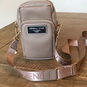 Kendall + Kylie Los Angeles Studio phone crossbody bag.